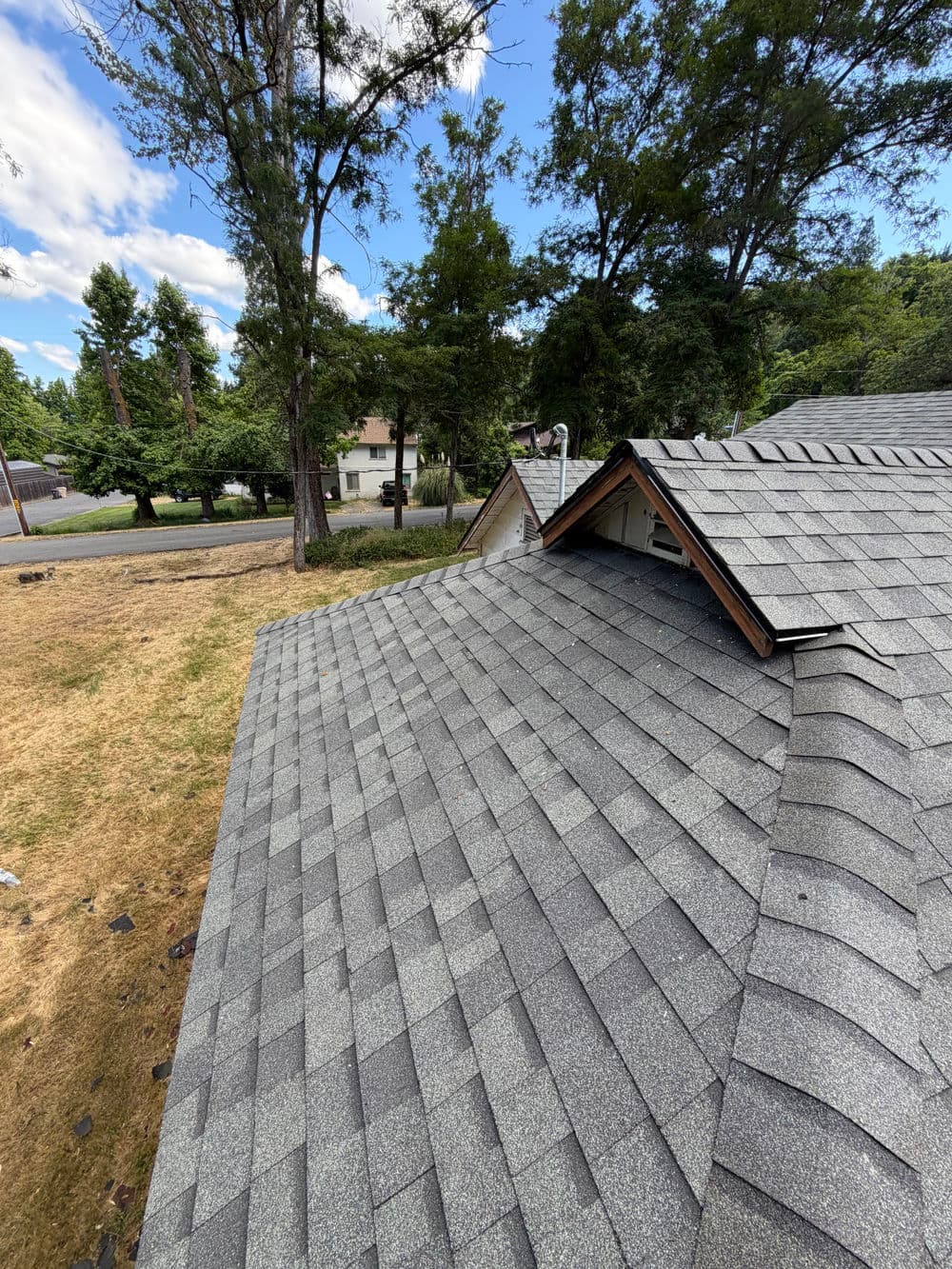 Damaged Rental Roof Replaced With New Shingles in Grants Pass